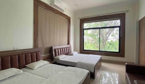 Comfort Quadruple Room, Garden View