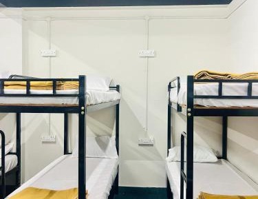Single Bed in Dormitory Room