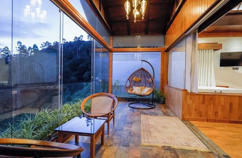 Periyur Hotel | Chandys Drizzle Drops Munnar Top Station