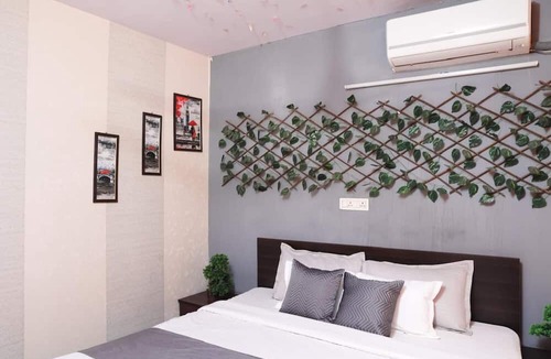 Sainik Farm Hotel | Roomshala 081 Manya Residency