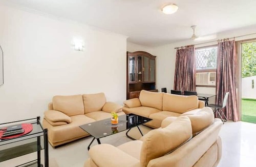 Chittaranjan Apartment | Cozy 2BHK with Private Terrace in GK1 – Walk to M Block Market!