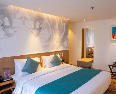 Sigra Hotel | The Atlantiis Suites Nr Vishwanath Temple
