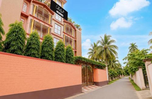 Sualkuchi Hotel | Collection O Downtown Hospital Guwahati Formerly Cherry City Cottage