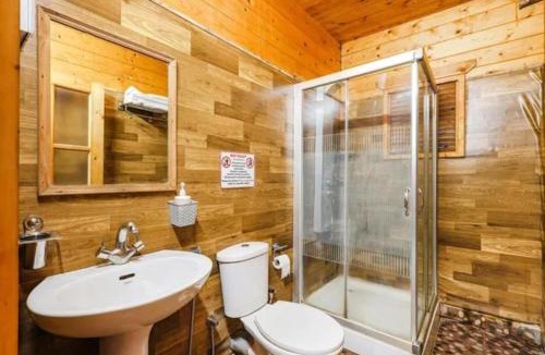 Morjim Hotel | FabHotel Wenzet Cottages