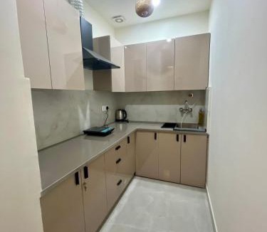 Ghata Apartment | Stylish 1BHK with Projector Your Private Escape