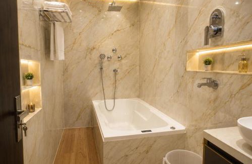 Sigra Hotel | The Hotel Atlantis Suites Sigra Road Near Vishwanath Temple