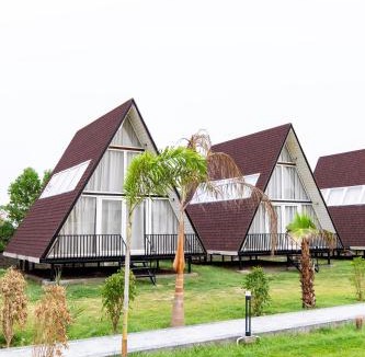Faridabad Villa | Malik Farms Countryside Wooden Cottage on 2 Acre Estate with Shared Pool, Garden & Restaurant