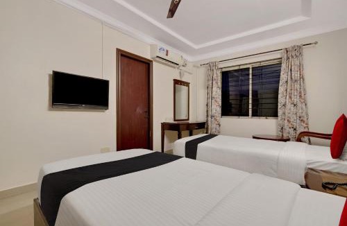 Jayanagar Hotel | Capital O Elegant Amethyst Business Hotel Near Ragigudda Sri Prasanna Anjaneyaswamy Temple