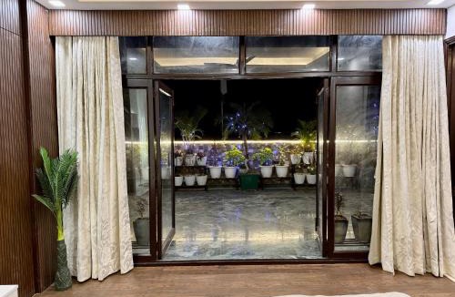 Lajpat Nagar Apartment | The Bageecha 2BR Suite with Lift & Terrace Garden