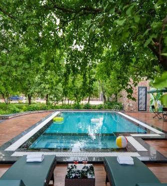 Hathnoda Bagh Cottage within a Mini Resort with Open Shower, Shared Pool, Restaurant, Sit Out & Garden