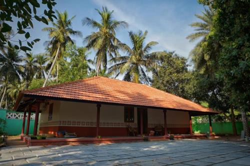 Cashew hut in ECR- A Peaceful Garden Retreat