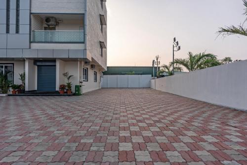 Treebo Premium Pine Tree Courtyard
