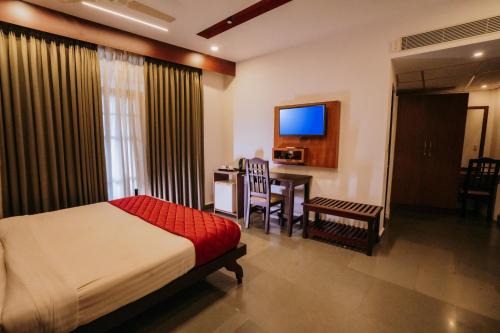 Nirmallyam Residency Hotel